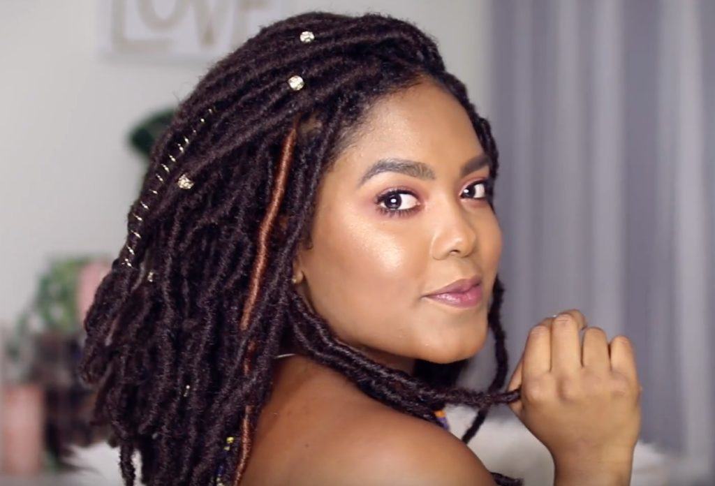 Woman with medium length marley twists with accent hair colours