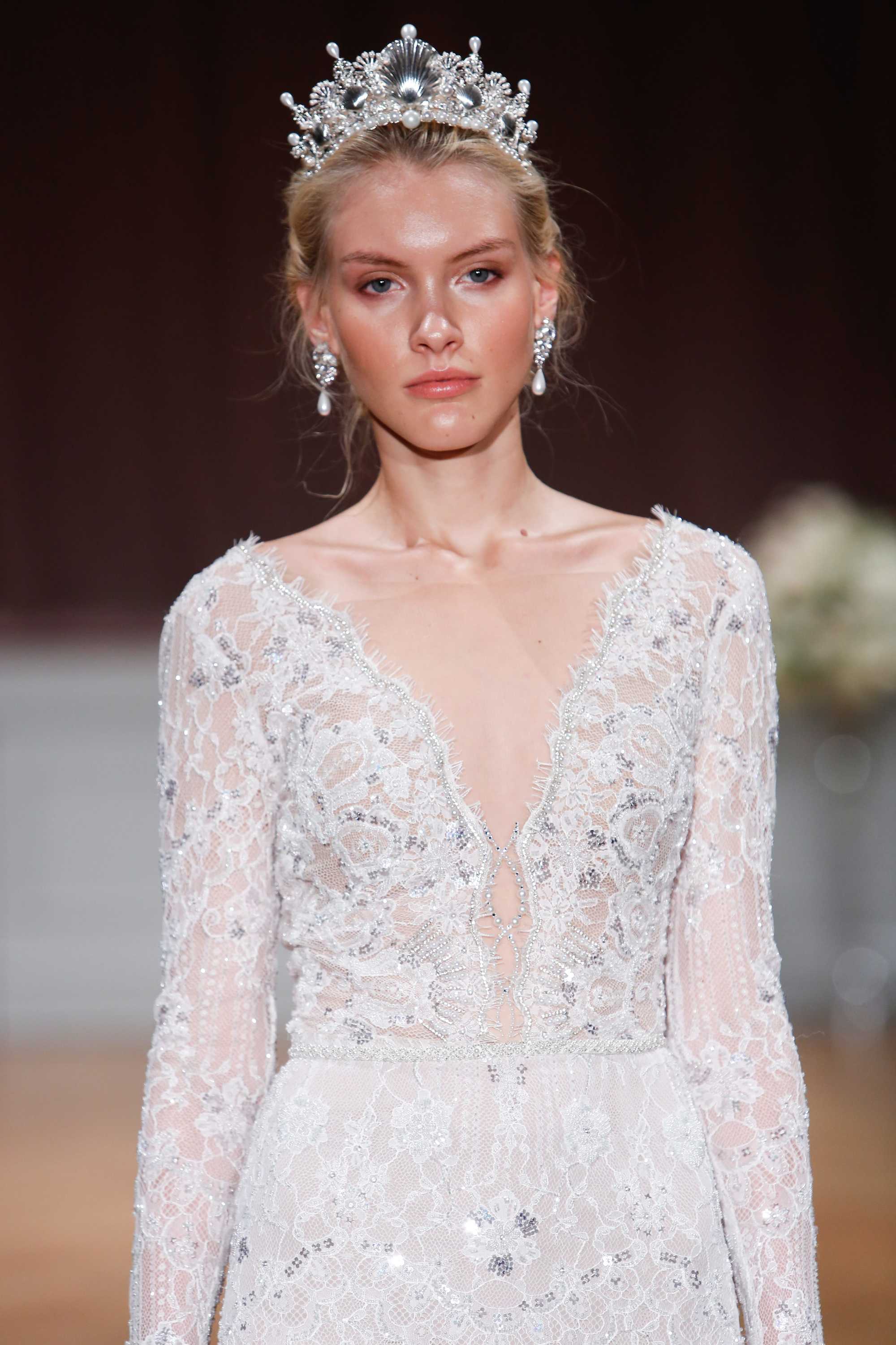 bridal model with a plunging gown and tiara