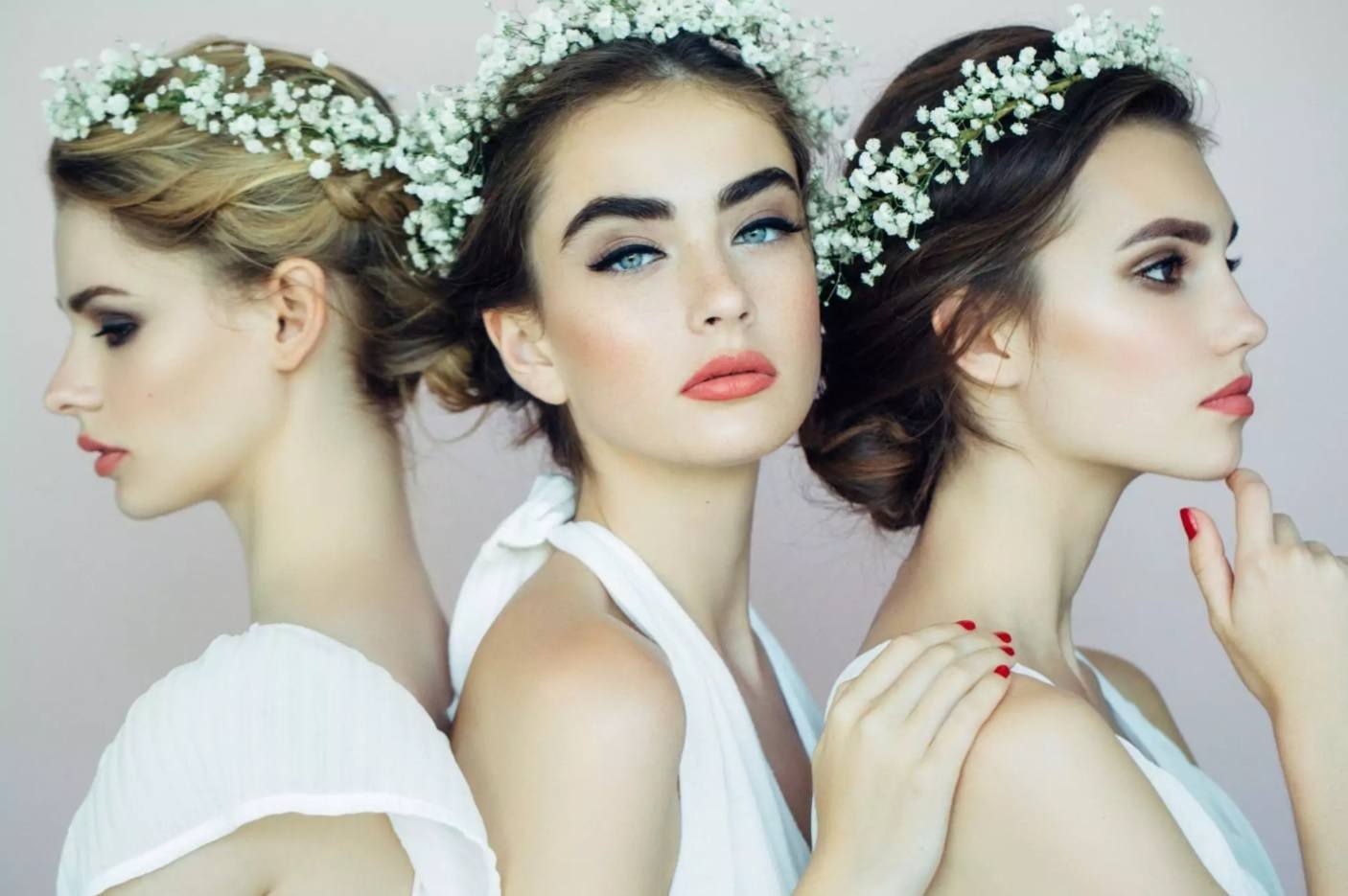 three bridal models with flower crown hair accessories