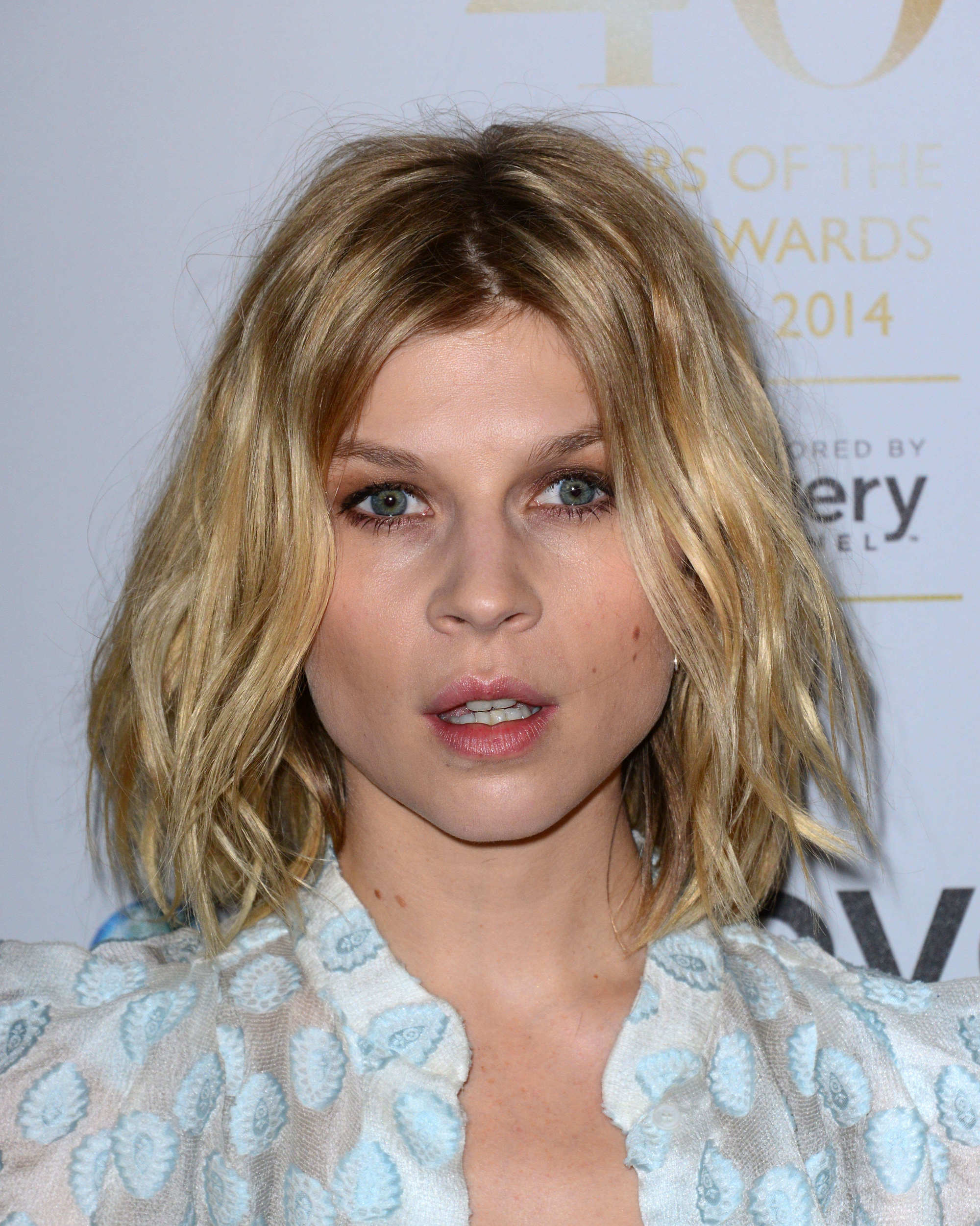 Clemence Poesy with golden, beachy short bob haircut