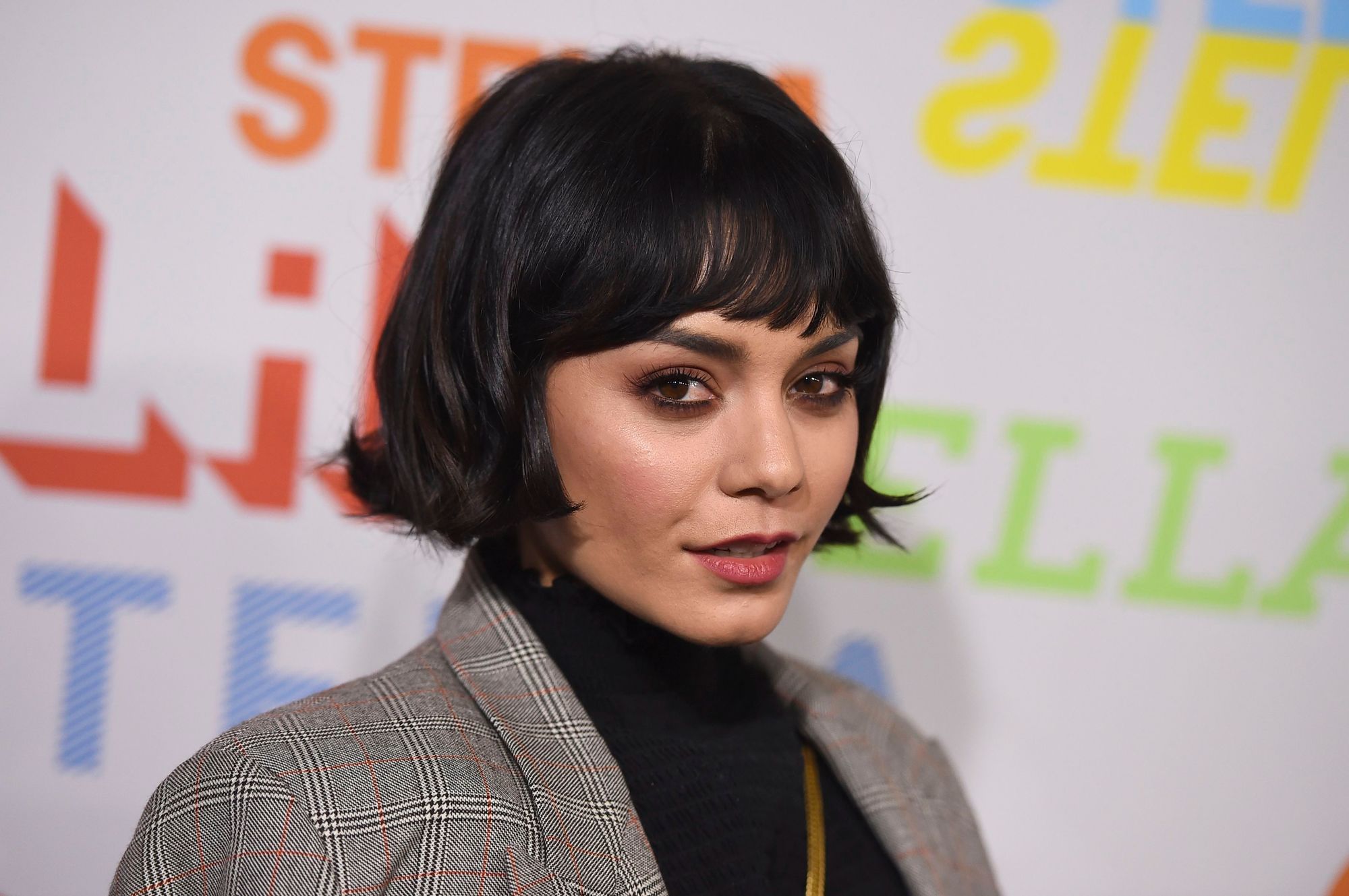 Vanessa Hudgens with short, flippy dark brown French bob haircut