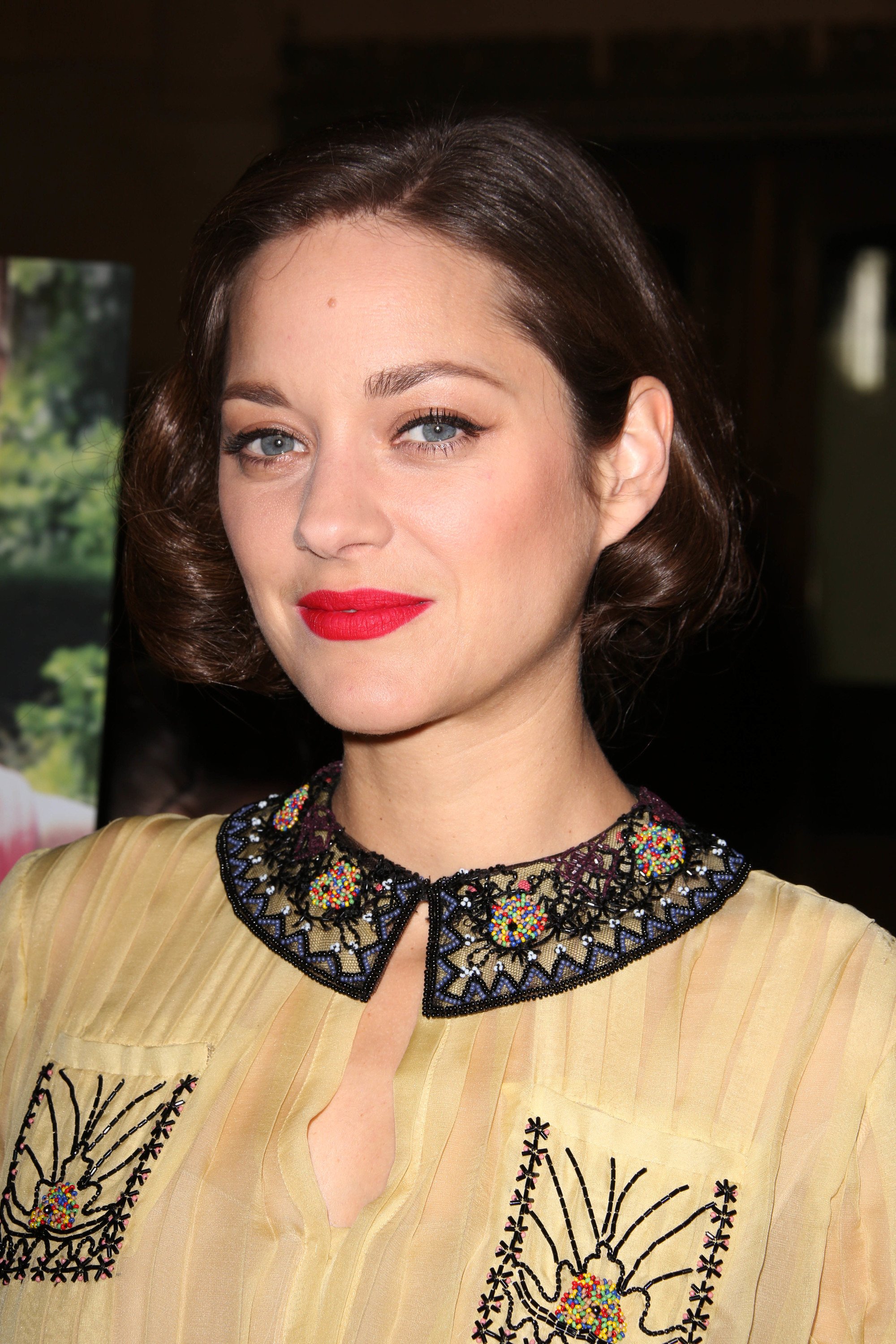 Marion Cotillard with chocolate brown curly retro bob
