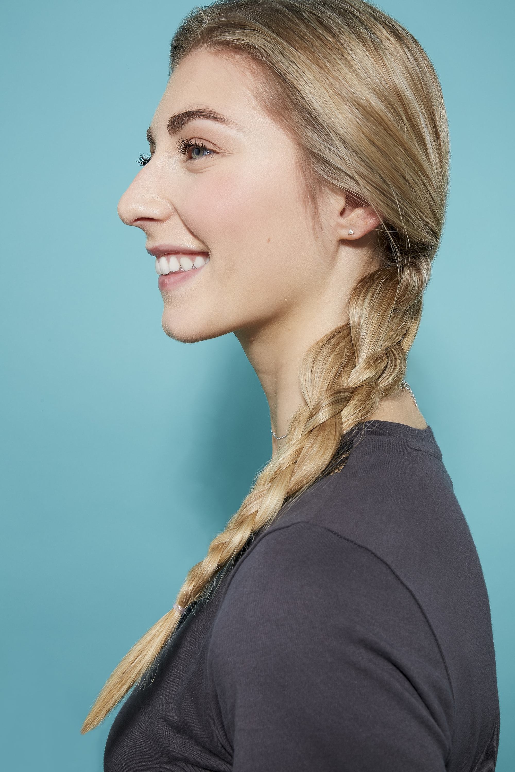 tresse à quatre brins sur de longs cheveux blonds