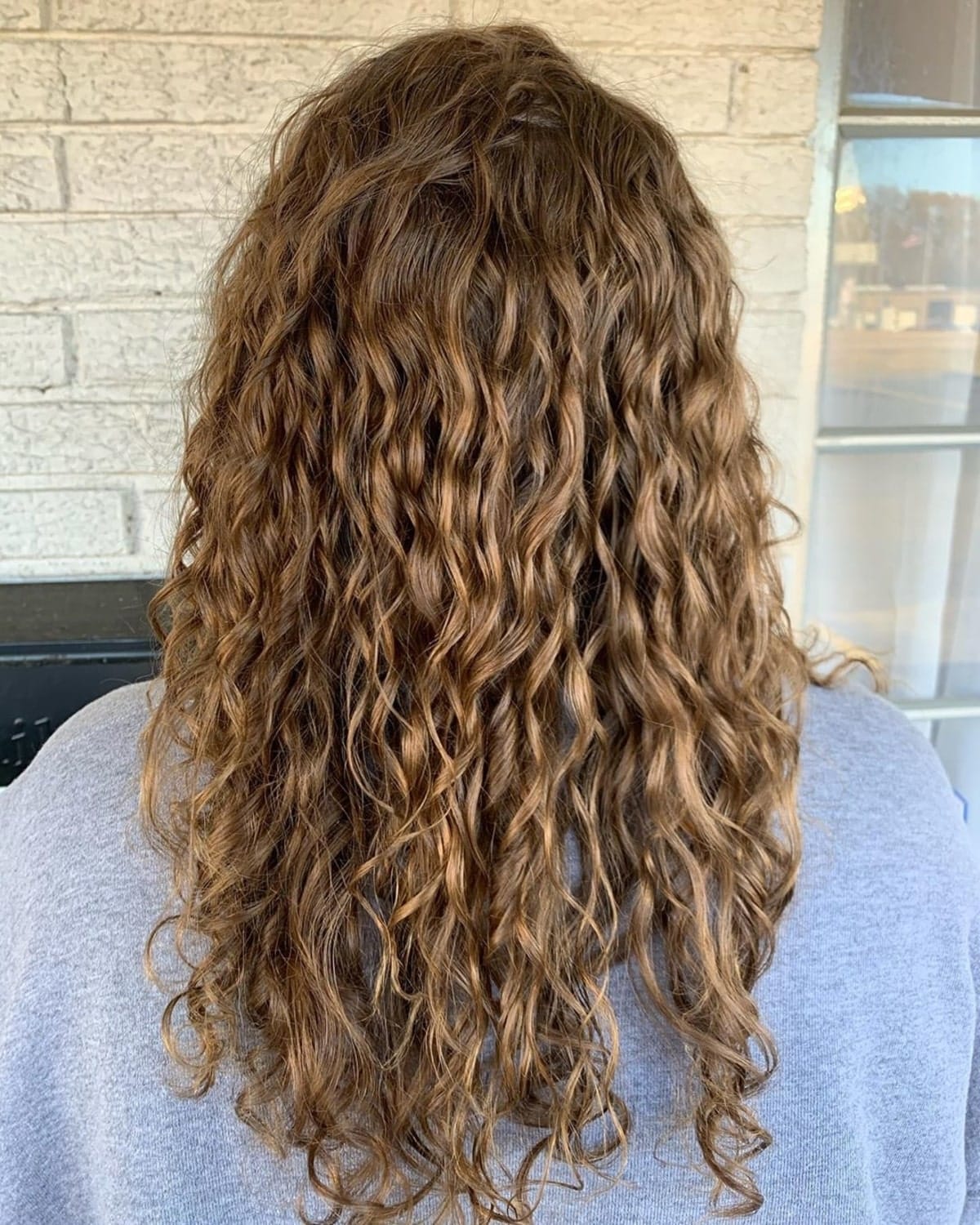 Perm frisé pour les cheveux longs