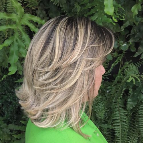 Plume blonde longueur d'épaule