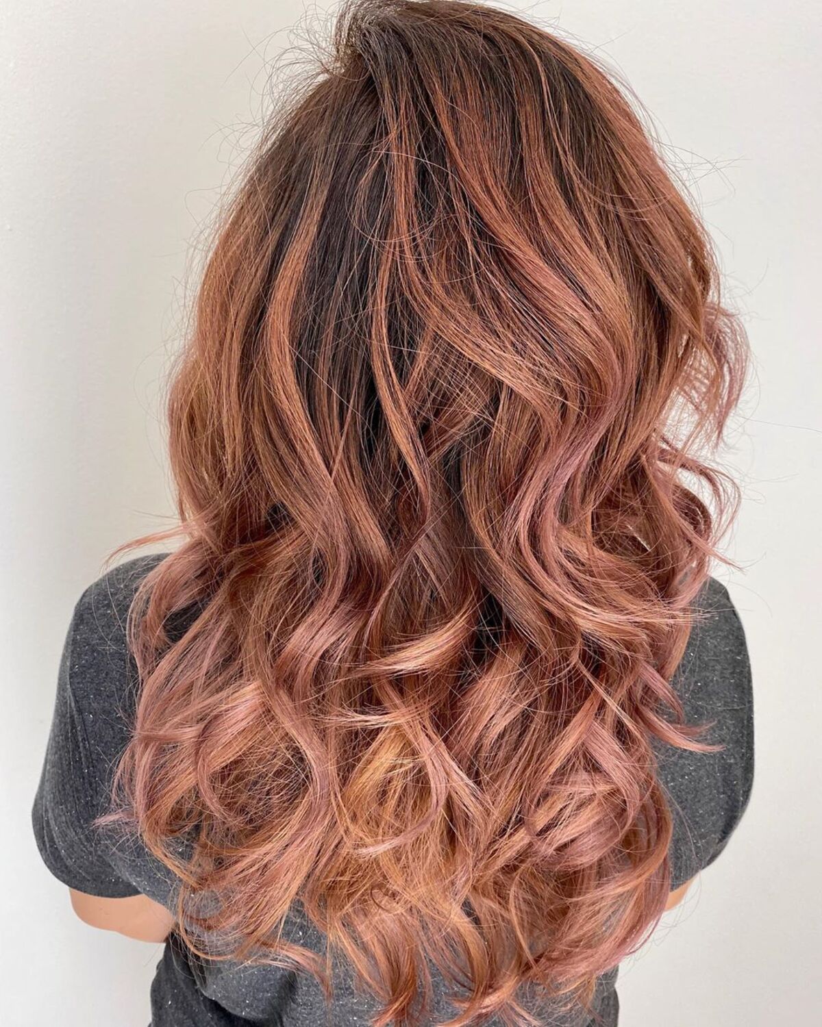 Mèches balayage or rose