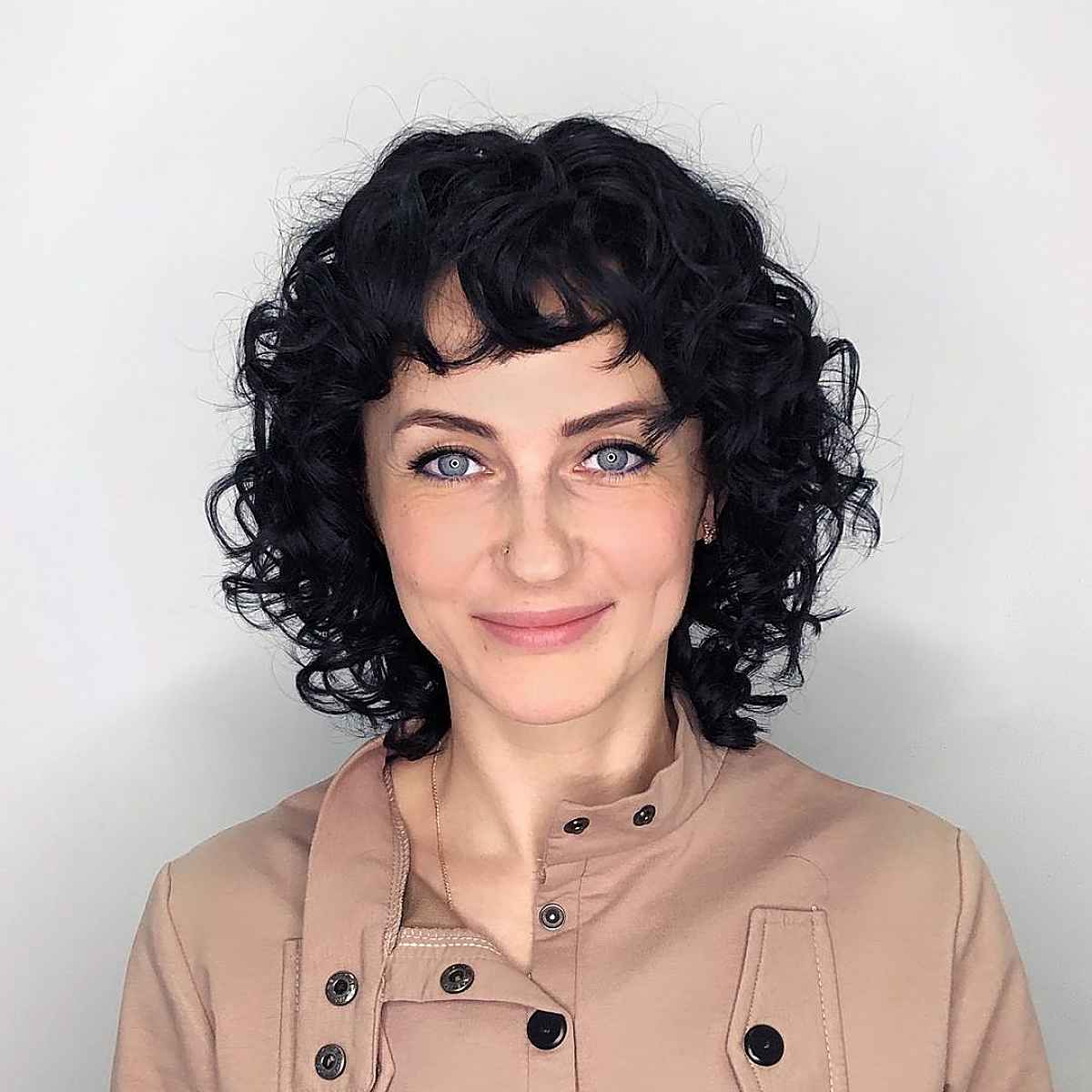 Shag aux épaules pour cheveux bouclés