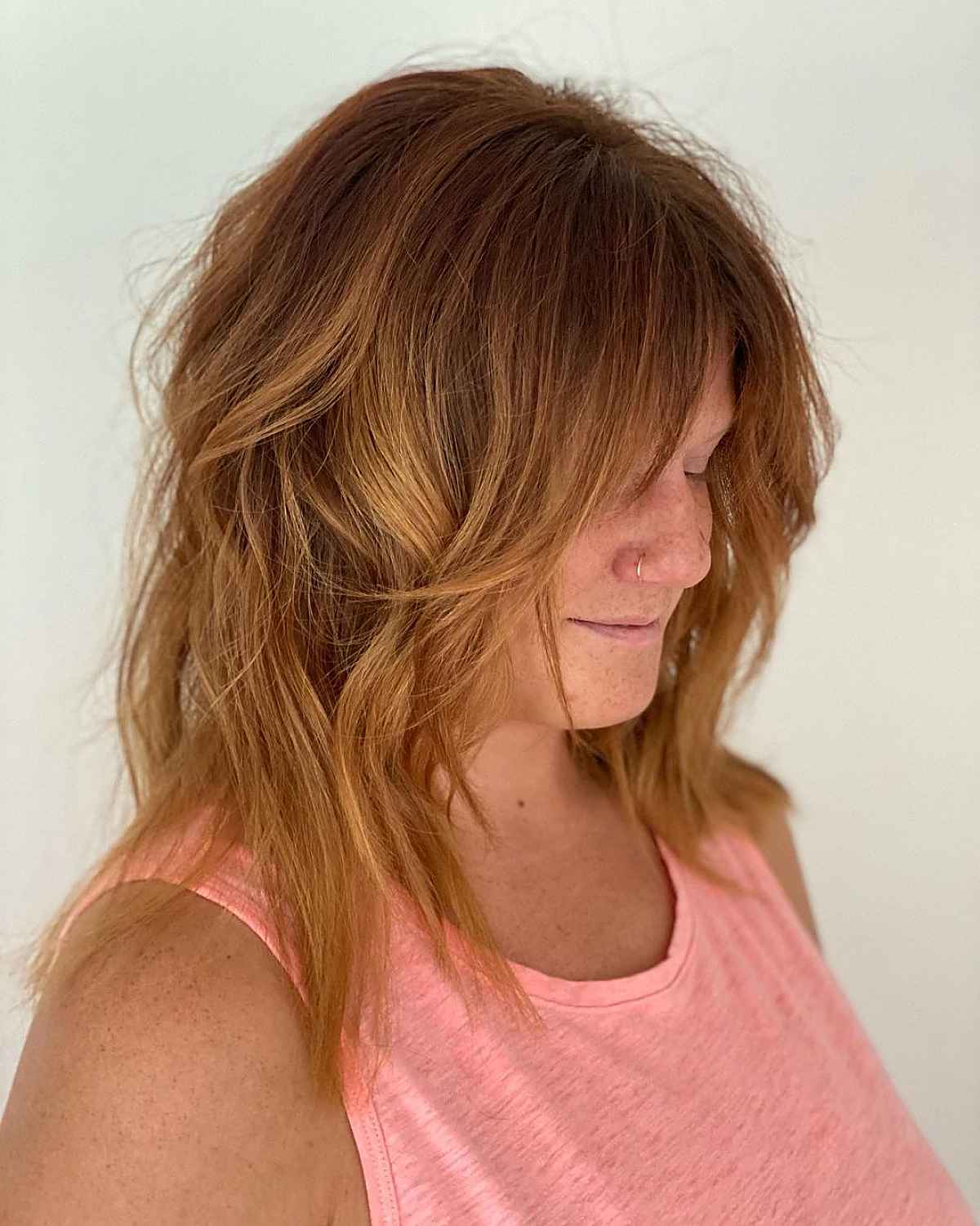 Edgy Shag pour les femmes de plus de 40 ans aux visages ronds
