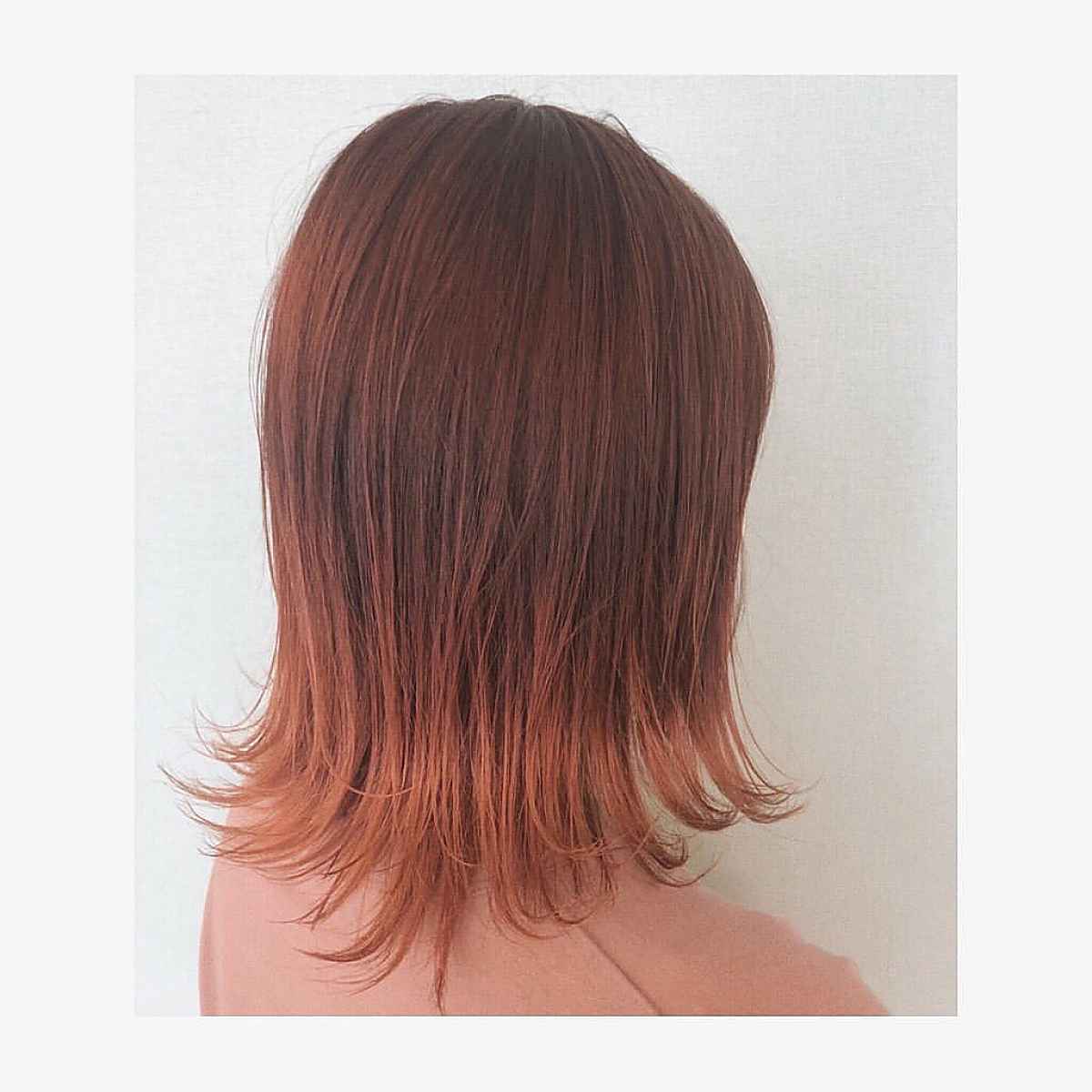 Cheveux de pieuvre à longueur d'épaule avec pointes retournées