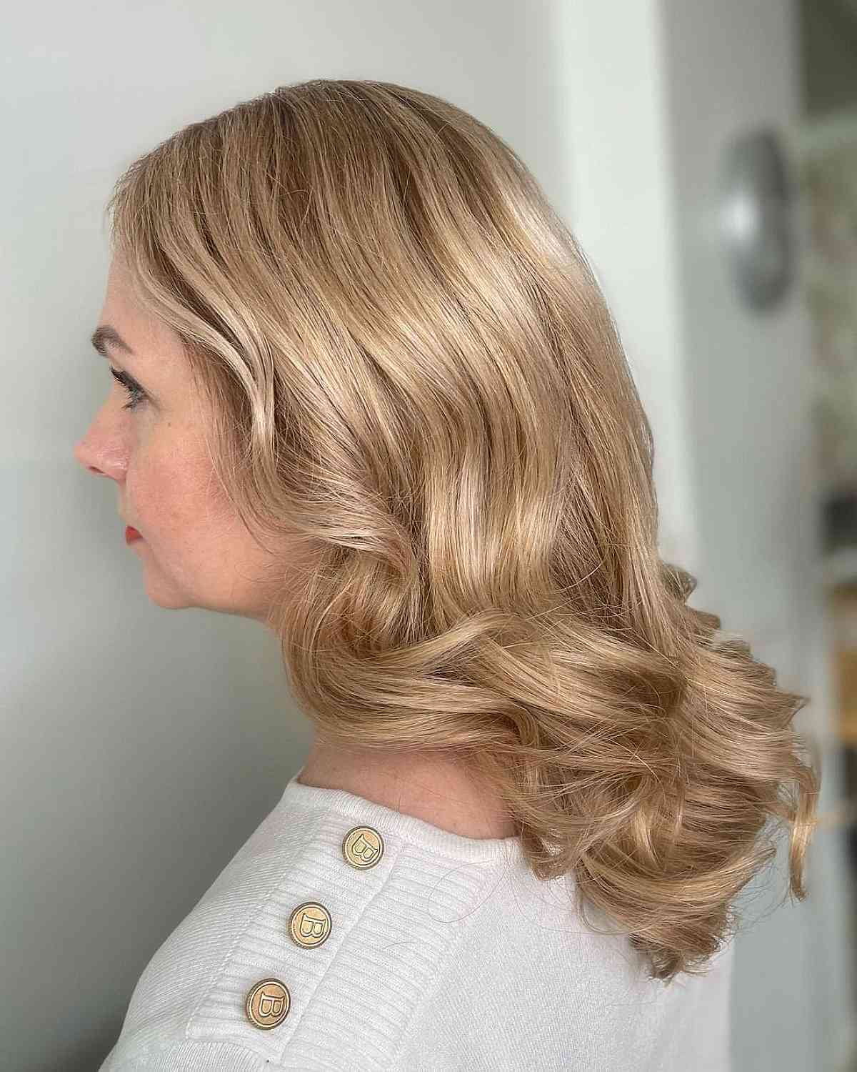 Mèches mouchetées blond miel clair