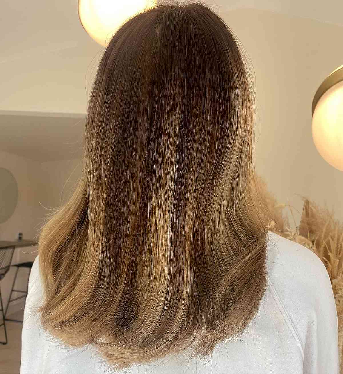 Blond miel et mèches caramel