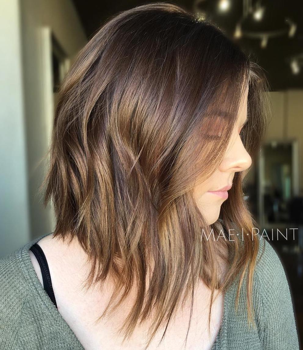 Choppy Brunette Stacked Lob with Bronze Highlights