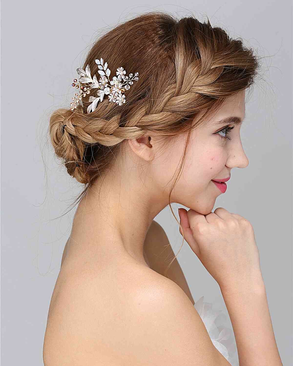 Modern Braid Updo with Rhinostone Leaves Medieval hairstyles