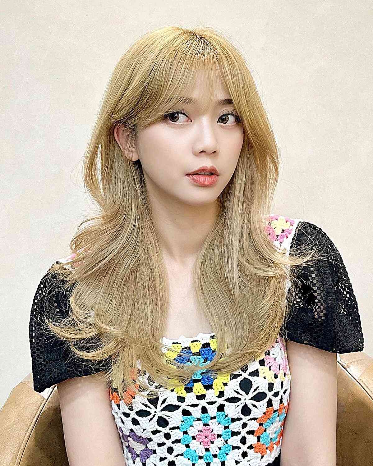 Chest-Length Feathery Hush Cut for Blonde Hair